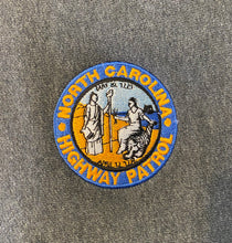 Load image into Gallery viewer, Embroidered Seal Hoodie