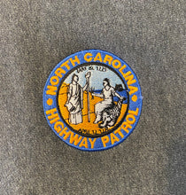 Load image into Gallery viewer, Embroidered Seal Hoodie
